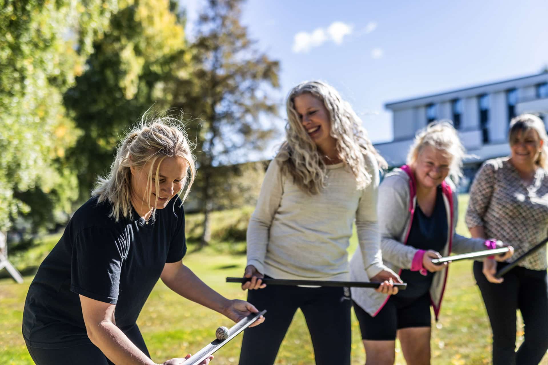 Guests axe throwing during team building at Hurdalsjøen Hotell